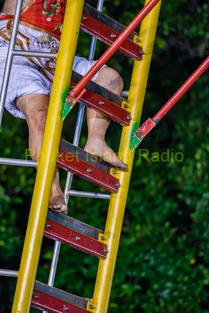 Climbing the blade ladder in Phuket Shrine.