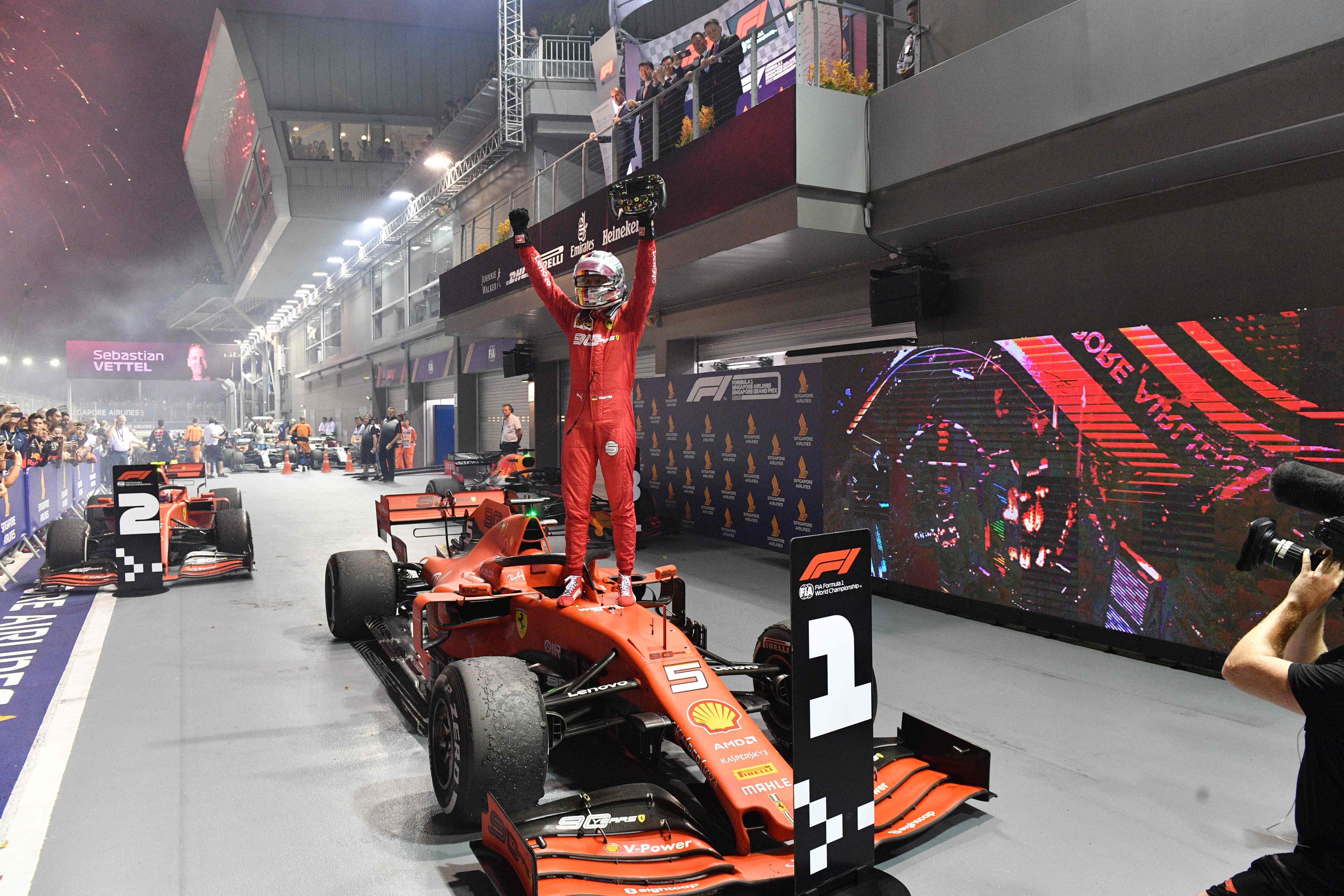 Sebastian Vettel celebrates his victory in Singapore